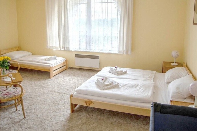 Imagen de la habitación del Hotel World of Harmony. Foto 13