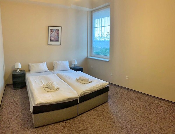 Imagen de la habitación del Hotel World of Harmony. Foto 14