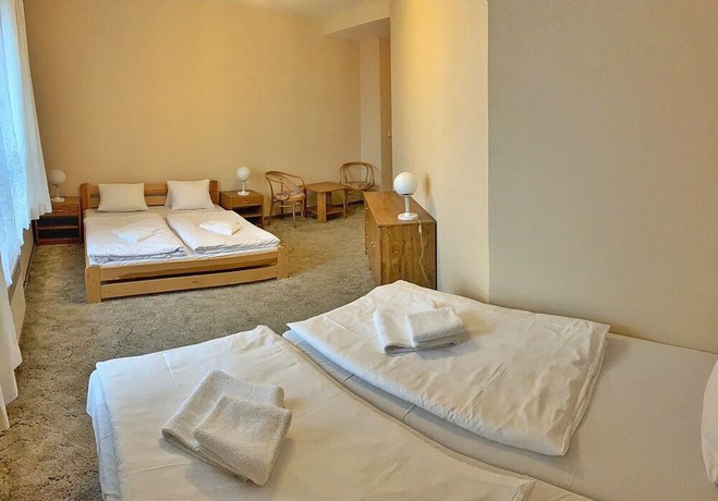 Imagen de la habitación del Hotel World of Harmony. Foto 15