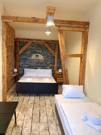 Imagen de la habitación del Hotel World of Harmony. Foto 16