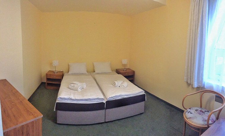 Imagen de la habitación del Hotel World of Harmony. Foto 18