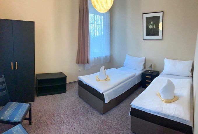 Imagen de la habitación del Hotel World of Harmony. Foto 19
