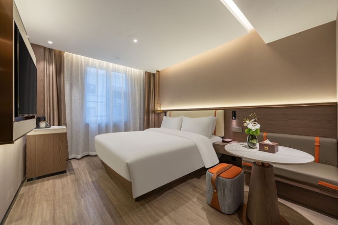 Imagen de la habitación del Hotel WorldQuancheng Sqr Kuanholi Branch. Foto 3