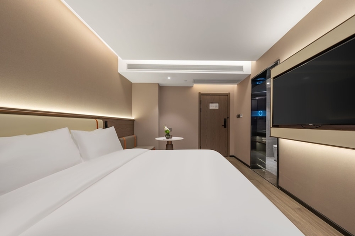 Imagen de la habitación del Hotel WorldQuancheng Sqr Kuanholi Branch. Foto 4