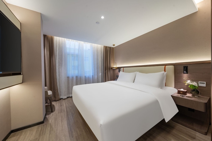 Imagen de la habitación del Hotel WorldQuancheng Sqr Kuanholi Branch. Foto 5