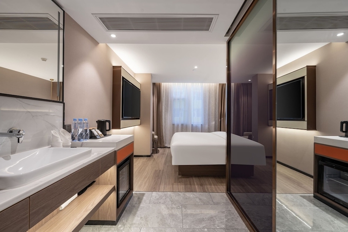 Imagen de la habitación del Hotel WorldQuancheng Sqr Kuanholi Branch. Foto 6