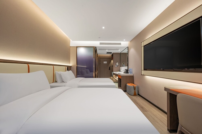 Imagen de la habitación del Hotel WorldQuancheng Sqr Kuanholi Branch. Foto 8