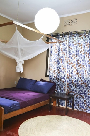 Imagen de la habitación del Hotel Worlds Collide Africa House. Foto 7