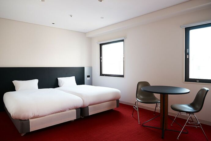 Imagen de la habitación del Hotel Wpu Shinjuku. Foto 17