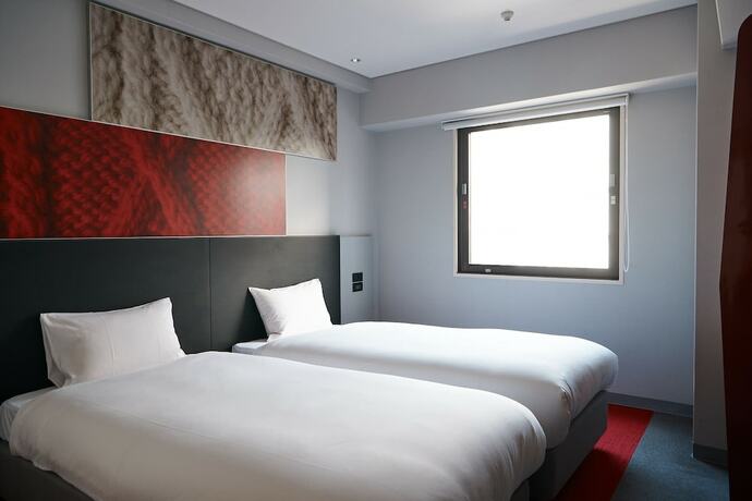 Imagen de la habitación del Hotel Wpu Shinjuku. Foto 19