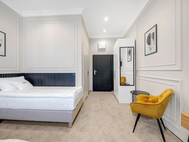 Imagen de la habitación del Hotel Wschodnia Elegans Aparthotel. Foto 13