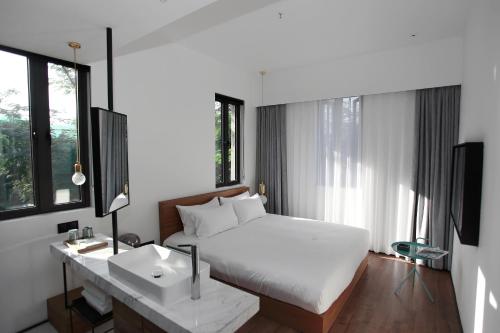 Imagen de la habitación del Hotel Wu Lan. Foto 8