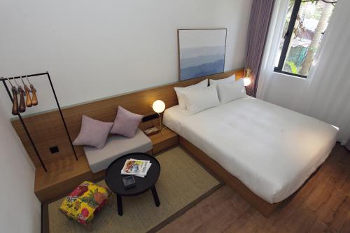 Imagen de la habitación del Hotel Wu Lan. Foto 9