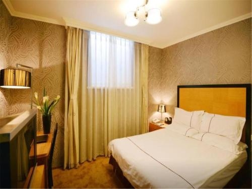 Imagen de la habitación del Hotel Wu Sheng Guan Holiday. Foto 3