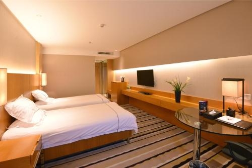 Imagen de la habitación del Hotel Wu Sheng Guan Holiday. Foto 5
