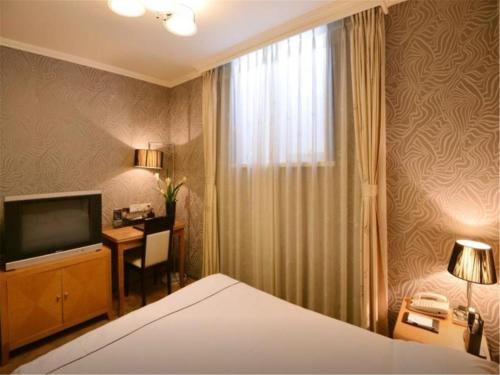 Imagen de la habitación del Hotel Wu Sheng Guan Holiday. Foto 6