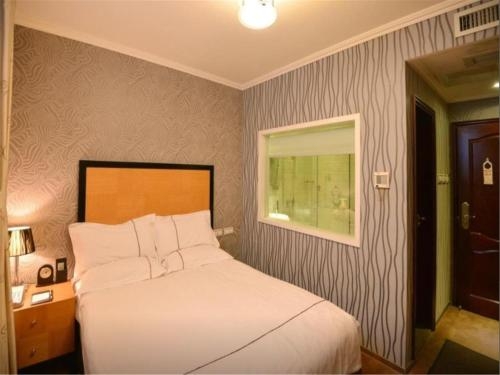 Imagen de la habitación del Hotel Wu Sheng Guan Holiday. Foto 7