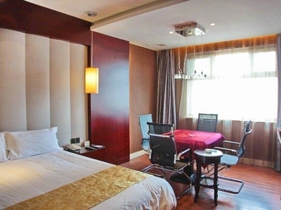 Imagen de la habitación del Hotel Wu Su Li. Foto 17
