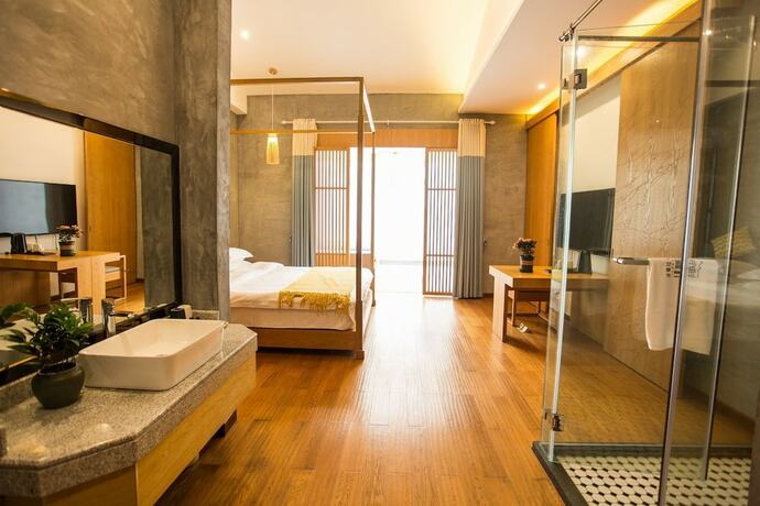 Imagen de la habitación del Hotel Wu Wei Qi Ju Lin Xi Villa Inn. Foto 15