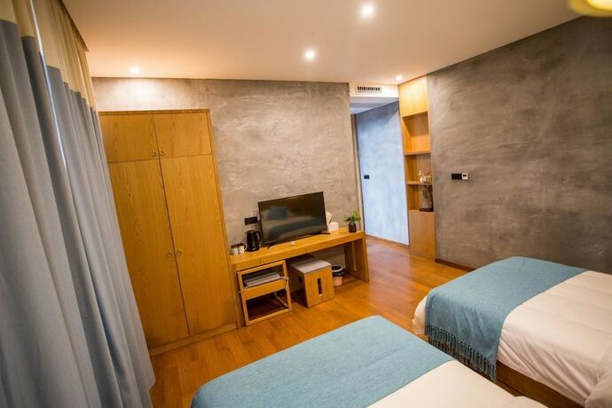 Imagen de la habitación del Hotel Wu Wei Qi Ju Lin Xi Villa Inn. Foto 16