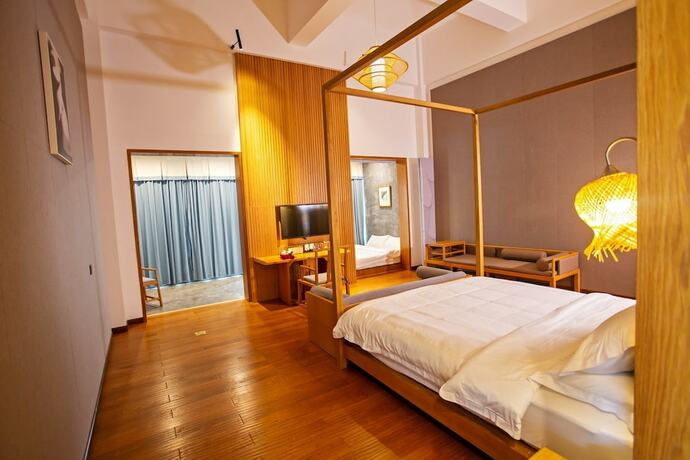 Imagen de la habitación del Hotel Wu Wei Qi Ju Lin Xi Villa Inn. Foto 18