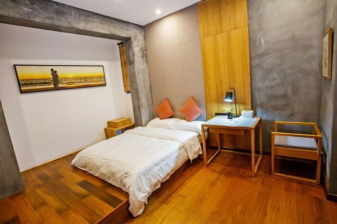 Imagen de la habitación del Hotel Wu Wei Qi Ju Lin Xi Villa Inn. Foto 19