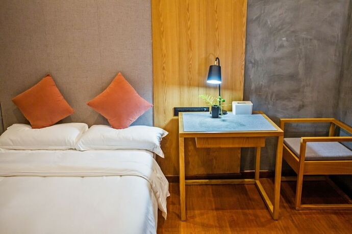 Imagen de la habitación del Hotel Wu Wei Qi Ju Lin Xi Villa Inn. Foto 21