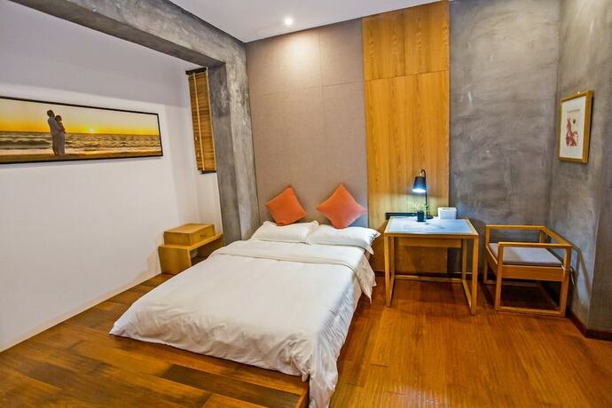 Imagen de la habitación del Hotel Wu Wei Qi Ju Lin Xi Villa Inn. Foto 22