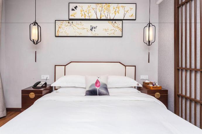 Imagen de la habitación del Hotel Wu Xi. Foto 5