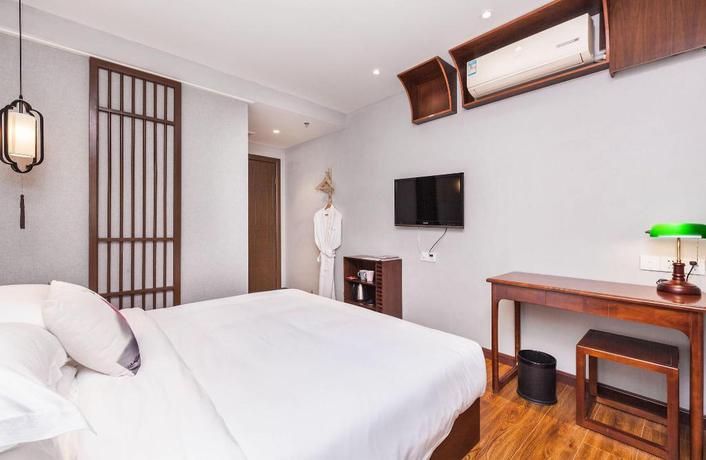 Imagen de la habitación del Hotel Wu Xi. Foto 6
