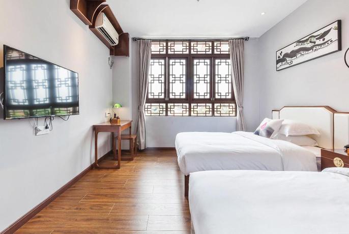 Imagen de la habitación del Hotel Wu Xi. Foto 8