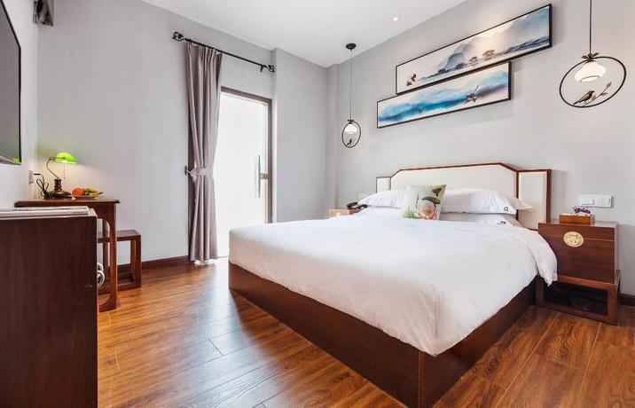 Imagen de la habitación del Hotel Wu Xi. Foto 9