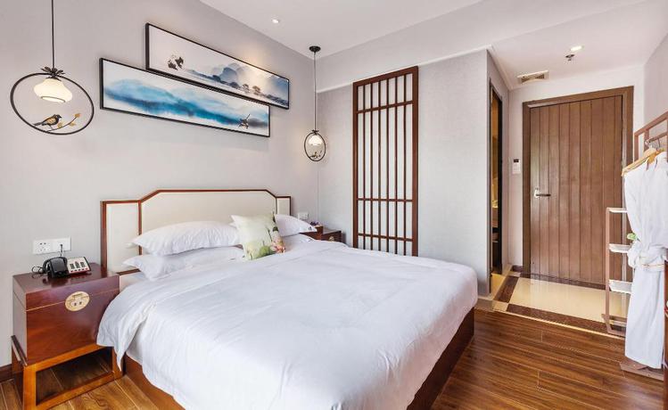 Imagen de la habitación del Hotel Wu Xi. Foto 11