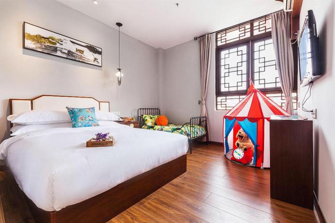 Imagen de la habitación del Hotel Wu Xi. Foto 13