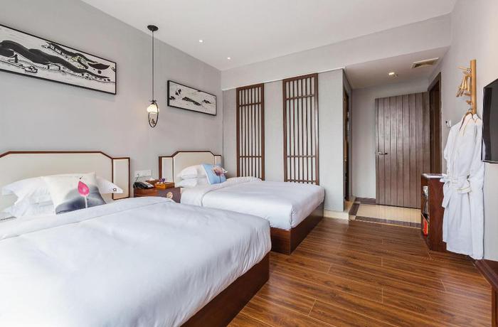 Imagen de la habitación del Hotel Wu Xi. Foto 14