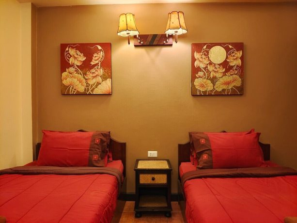 Imagen de la habitación del Hotel Wualai Boutique by Lanna Oriental. Foto 10