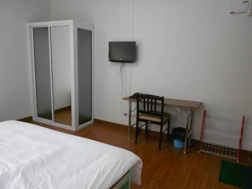 Imagen de la habitación del Hotel Wualai Soi 5 Apartment. Foto 4