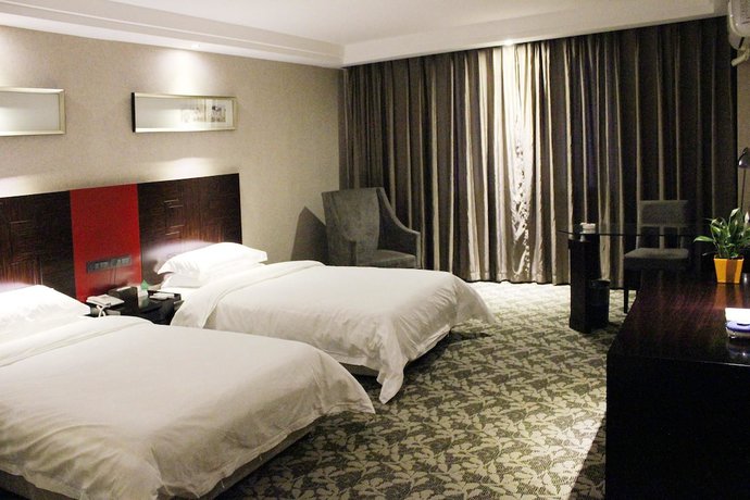 Imagen de la habitación del Hotel Wudang Impression Hotel. Foto 8