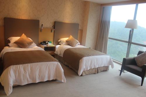 Imagen de la habitación del Hotel Wudang International. Foto 7