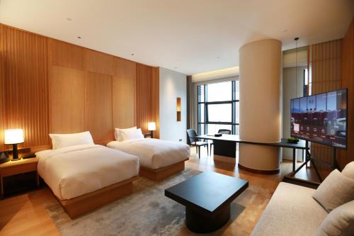 Imagen de la habitación del Hotel Wudang Mountain The Yew House. Foto 15