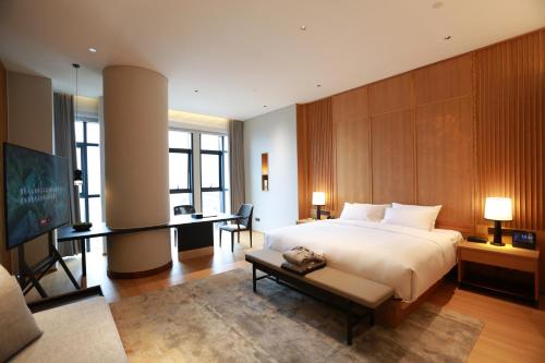 Imagen de la habitación del Hotel Wudang Mountain The Yew House. Foto 16