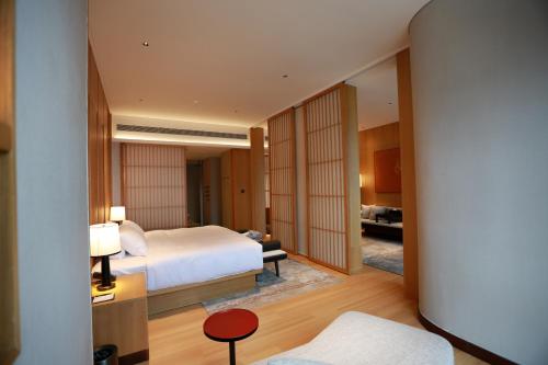 Imagen de la habitación del Hotel Wudang Mountain The Yew House. Foto 18