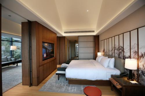 Imagen de la habitación del Hotel Wudang Mountain The Yew House. Foto 19