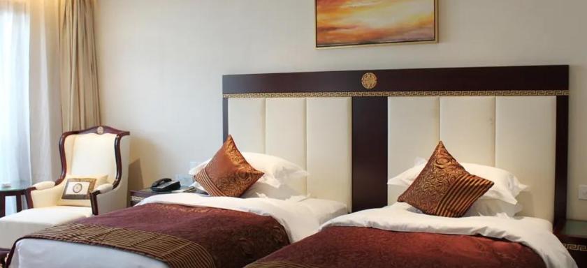 Imagen de la habitación del Hotel Wudangshan Jianguo Hotel. Foto 7