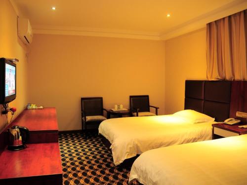 Imagen de la habitación del Hotel Wudangshan Xin'ning Business. Foto 8