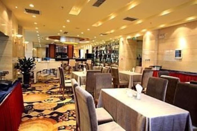 Imagen del bar/restaurante del Hotel Wuhai Binhe Guoji. Foto 3