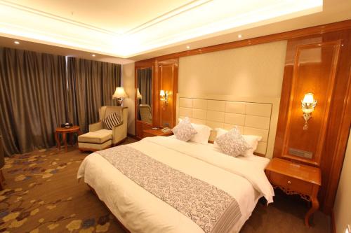 Imagen de la habitación del Hotel Wuhai Xiyue International. Foto 4