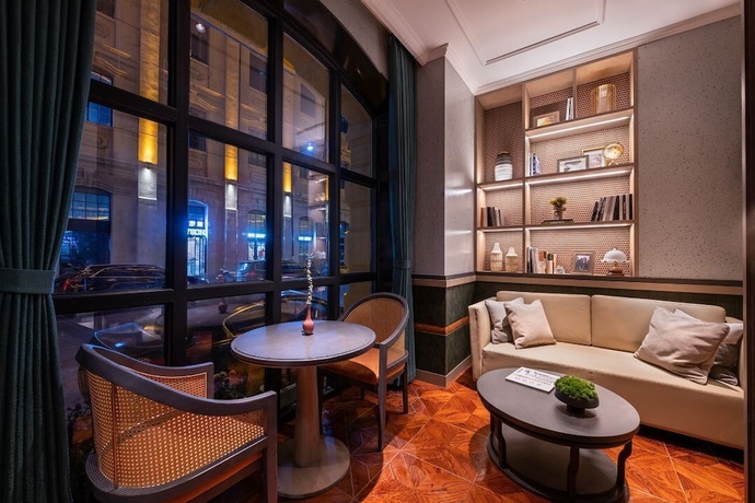 Imagen de los interiores del Hotel Wuhan Hankou Jiangtan Manxin Mansion. Foto 15