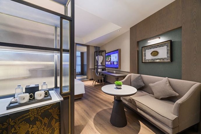 Imagen de la habitación del Hotel Wuhan Hankou Jiangtan Manxin Mansion. Foto 3