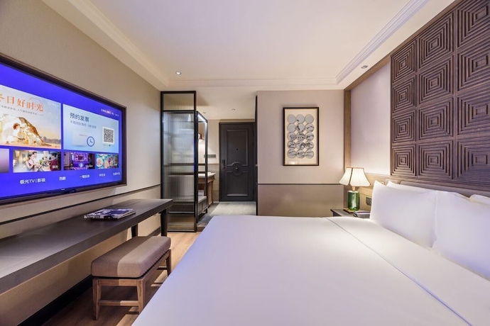 Imagen de la habitación del Hotel Wuhan Hankou Jiangtan Manxin Mansion. Foto 10